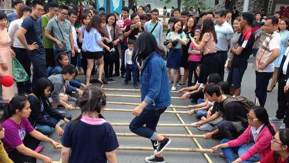 Hoan Kiem Lake Walking Street, lively with weekend activities and street performances.
