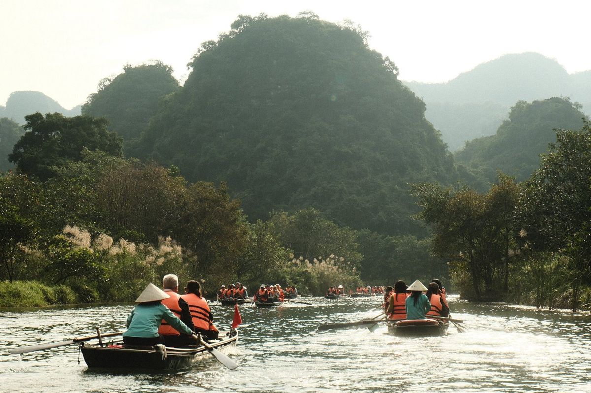 Boats winding through the Trang An valleys Boats winding through the Trang An valleys