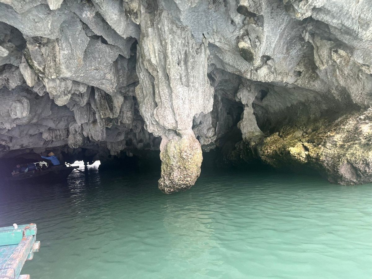An emerald sea cave in the bay An emerald sea cave in the bay