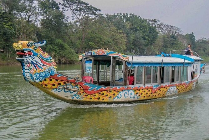 Traditional painted dragon boat on the Perfume River in Hue